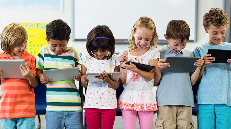 education kindergarten kids with tablets