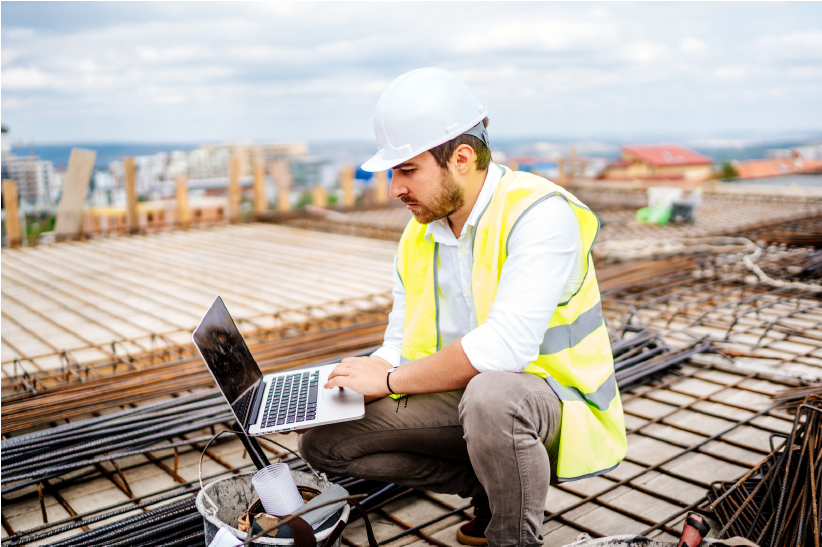 construction on roof with laptop