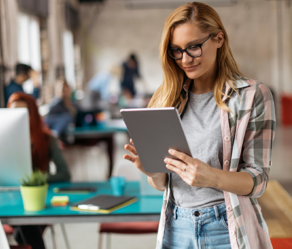 woman on tablet onsite